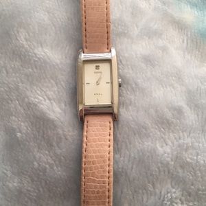 Beautiful ladies watch by Guess. Pink leather band